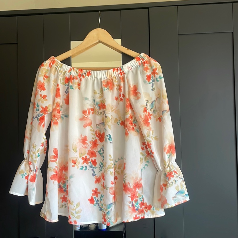 small off the shoulder floral shirt, slightly see through.